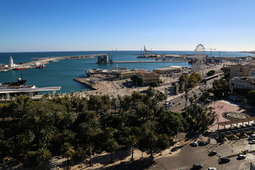 Fototapeta na wymiar view of port of Málaga spain with tha big park in front and the clear sunny sky