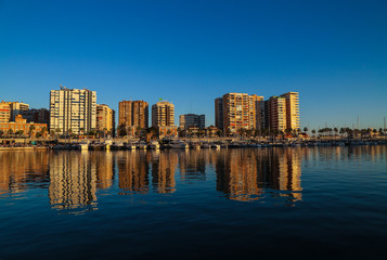 Fototapeta na wymiar harbour with skyline malaga spain 