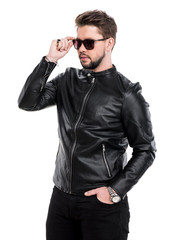 Fototapeta premium Young beard man in sunglasses wearing black leather jacket