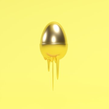 Golend Egg dripping with yellow paint on yellow background. minimal idea food.