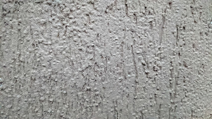The background of a gray wall. Soft focus.