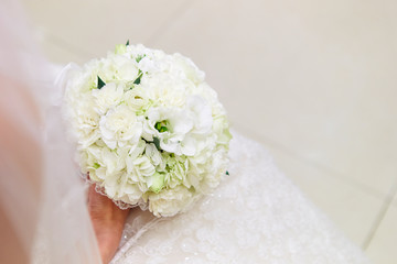 bride holding wedding bouquet