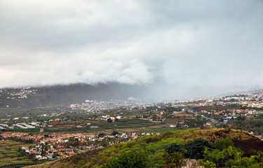 View of the green valley north coast of Tenerife on a rainy day, Canary Islands, Spain