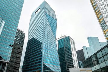 Obraz na płótnie Canvas Modern skyscrapers view in business downtown distric under sky i