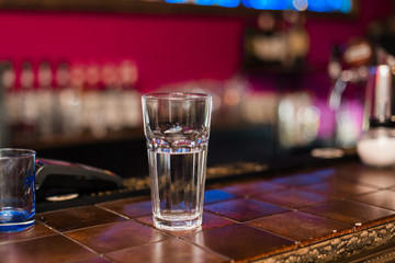 empty shot  at a party in a nightclub.  shot in bar.