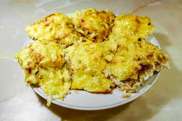 the fried fish fillet in batter in a pan