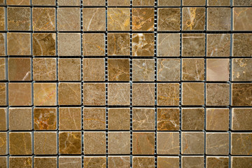 Mosaic of brown marble in the form of squares.