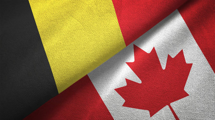 Fototapeta na wymiar Belgium and Canada two flags textile cloth, fabric texture