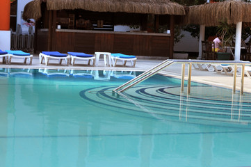 Swimming pool with blue water. Travels