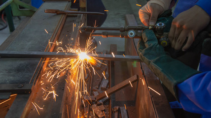Oxy-acetylene gas welding or cutting in a metal workshop