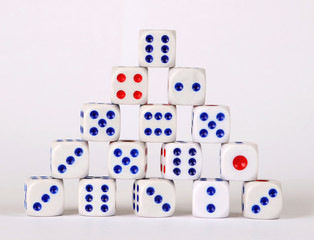 Pyramid of dice on a white background.
