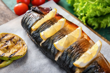 Tasty mackerel fish on board, closeup