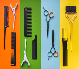 Ten tools hairdresser on the background of pastel paper in the form of multi-colored stripes. Minimalist pop art concept. Barbershop.