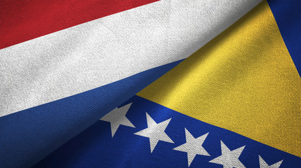 Netherlands and Bosnia and Herzegovina two flags textile cloth, fabric texture