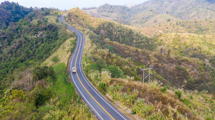 Road view with car on the mountain from above