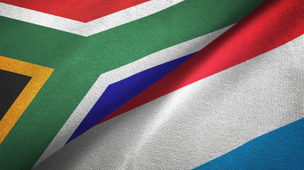 Fototapeta premium South Africa and Luxembourg two flags textile cloth, fabric texture