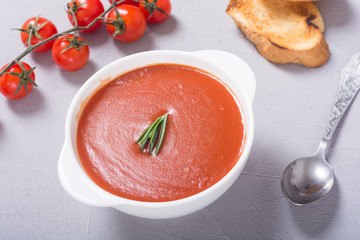 Fresh tomato cream soup in bowl