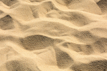 closeup sand pattern of a beach in the summer