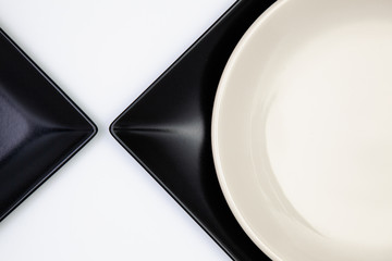 Different  plates on the white table.Top view.