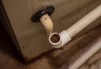 condensation drain has become plugged and must be cleaned