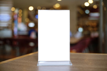 Menu frame standing on wood table in Bar restaurant cafe. space for text marketing promotion.