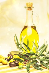 Bottle of Olive Oil with Green and Black Olives