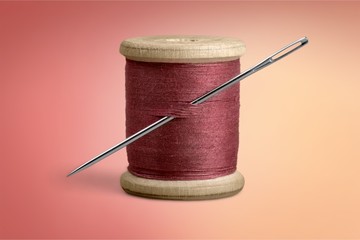 Spool of Thread and Needle