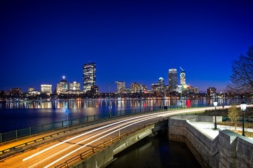 Long exposure of the Boston skyline from the Longfellow bridge on the Cambridge side. Overlooking the partially frozen Charles river with views of the Hancock building and Prudential center.