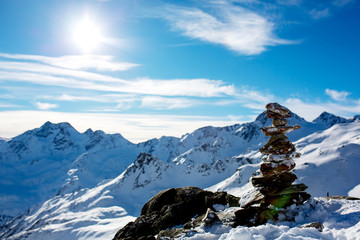 Obraz premium Happy people, children and adults, skiing on a sunny day in Tyrol mountains