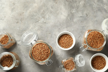 Composition with raw buckwheat on table