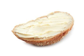 Slice of bread with butter on white background