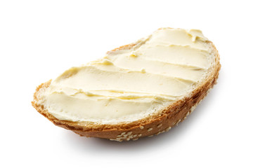 Slice of bread with butter on white background