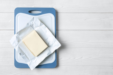 Healthy butter on wooden background