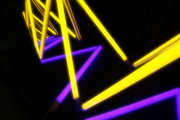 Bright neon lamps on dark background