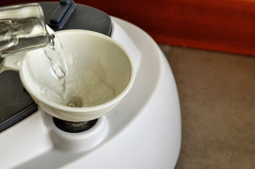 The steam iron boiler is supplied with water