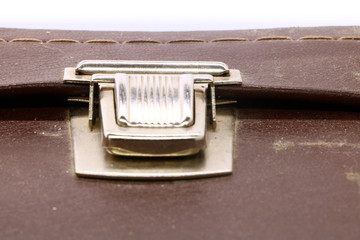 close up of old vintage suitcase lock closure