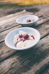 Ice cream with strawberry jam.