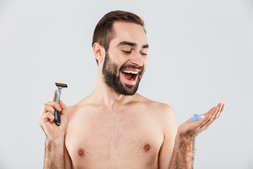 Fototapeta premium Portrait of a cheerful shirtless bearded man