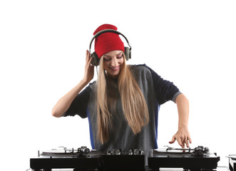 Female DJ playing music on white background