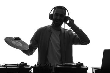 Silhouette of male DJ playing music on white background