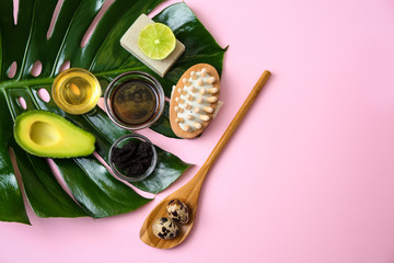 Natural ingredients and cosmetic on color background