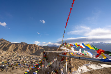 Monastery on the top of mountain hill with prayer tibetan flags in leh ladakh famous travel destination in Leh, Ladakh, India.