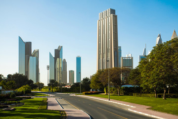 Fototapeta na wymiar Dubai, United Arab Emirates - June, 2018. Buildings, street, sunny day. Skycrapers