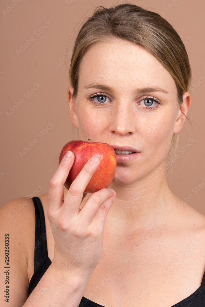 Wall mural girl with an apple