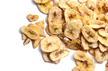 Dried banana chips isolated on white