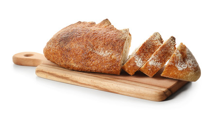 Board with cut loaf of fresh bread on white background