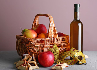Gift basket for Purim holiday on table