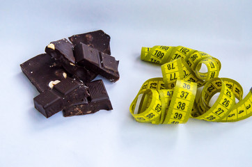 Sports fitness chocolate and yellow centimeter diet healthy lifestyle slimming