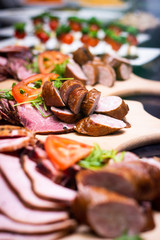 ham on a wooden board, catering offer
