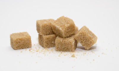 Brown sugar cubes isolated